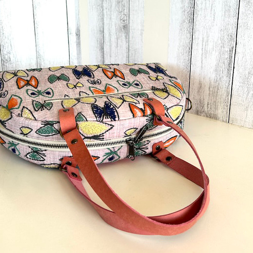 Creema限定、ミナペルホネンのSky flowerのピンクとパッチ半円