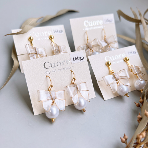 リボン ピアス/イヤリング ホワイト 白 おしゃれ プレゼント デート