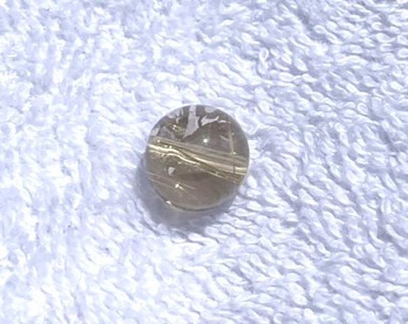 CYA【AAAA 金針水晶 虹入り 11.６mm 粒売】 ルチルクォーツ 天然石ビーズ 現物 4枚目の画像