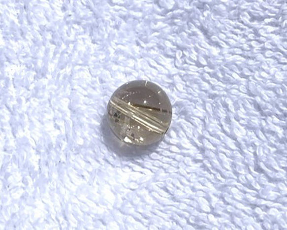 CYA【AAAA 金針水晶 虹入り 11.６mm 粒売】 ルチルクォーツ 天然石ビーズ 現物 5枚目の画像