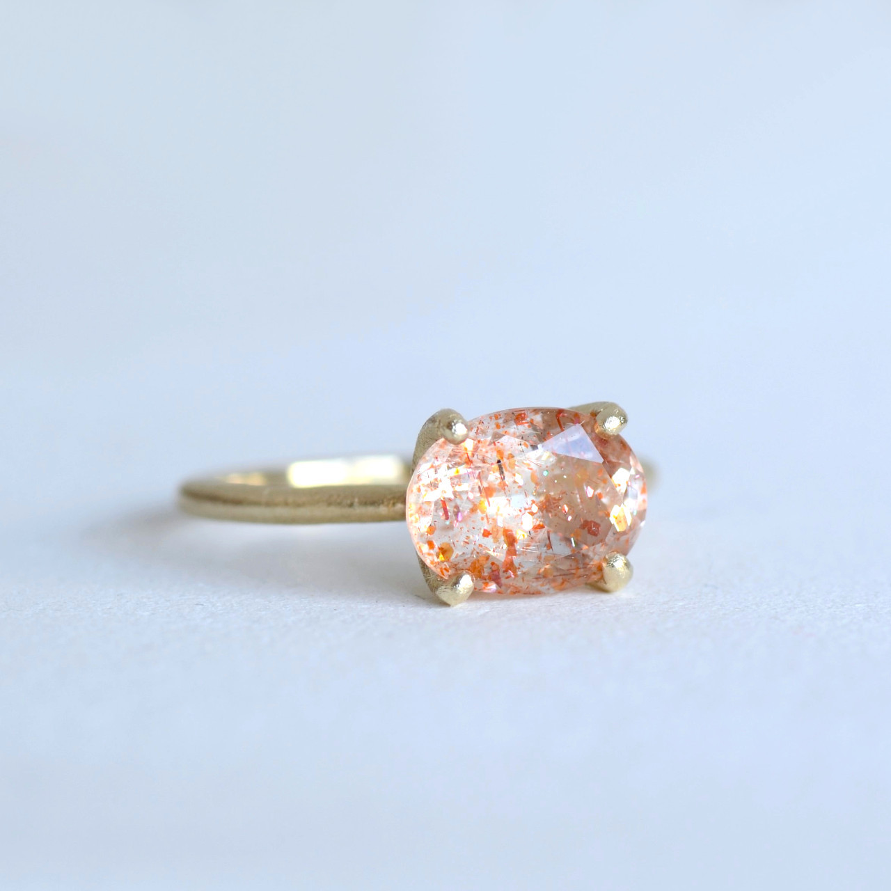 【一点物】K10・イリュージョンサンストーン　オーバルファセットリング