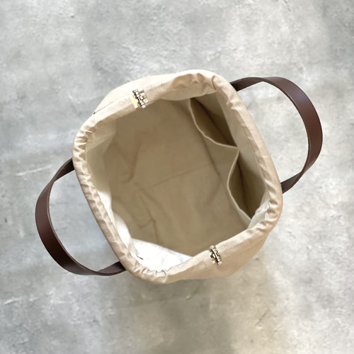 ⚮̈ミナペルホネン tambourine brown まるっこニュームバッグ