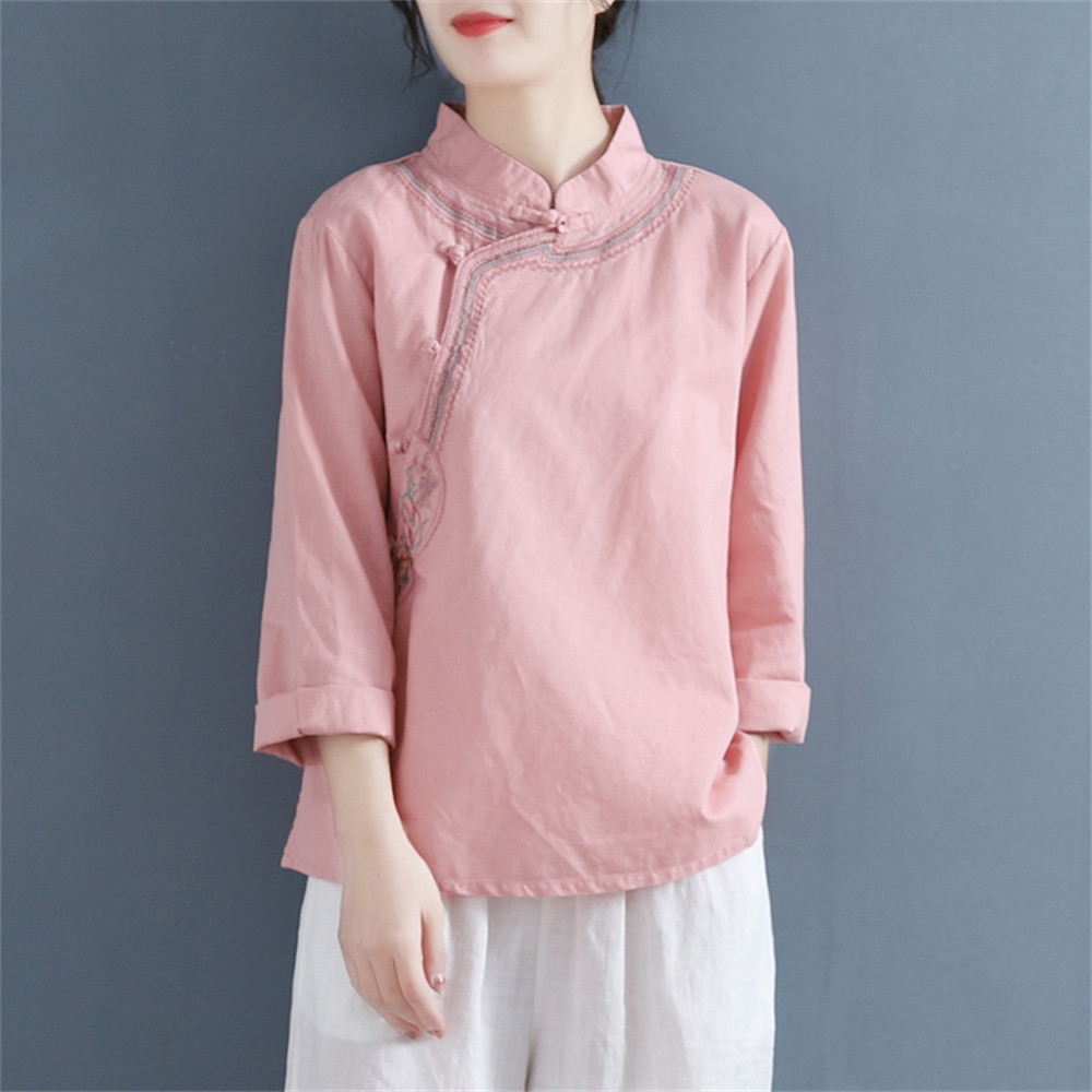 ルーズなタートルネック刺繍のレディースロングスリーブトップ