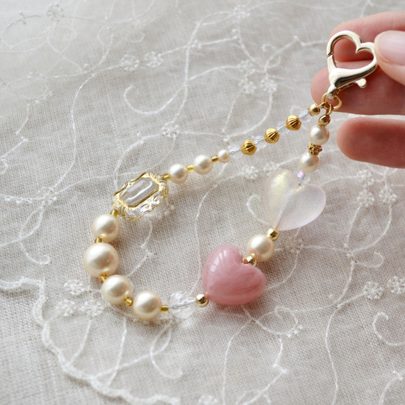 ぷっくりハートやパールのミニハンドストラップ ＆ スマホストラップ　ピンク×シャンパン 1枚目の画像