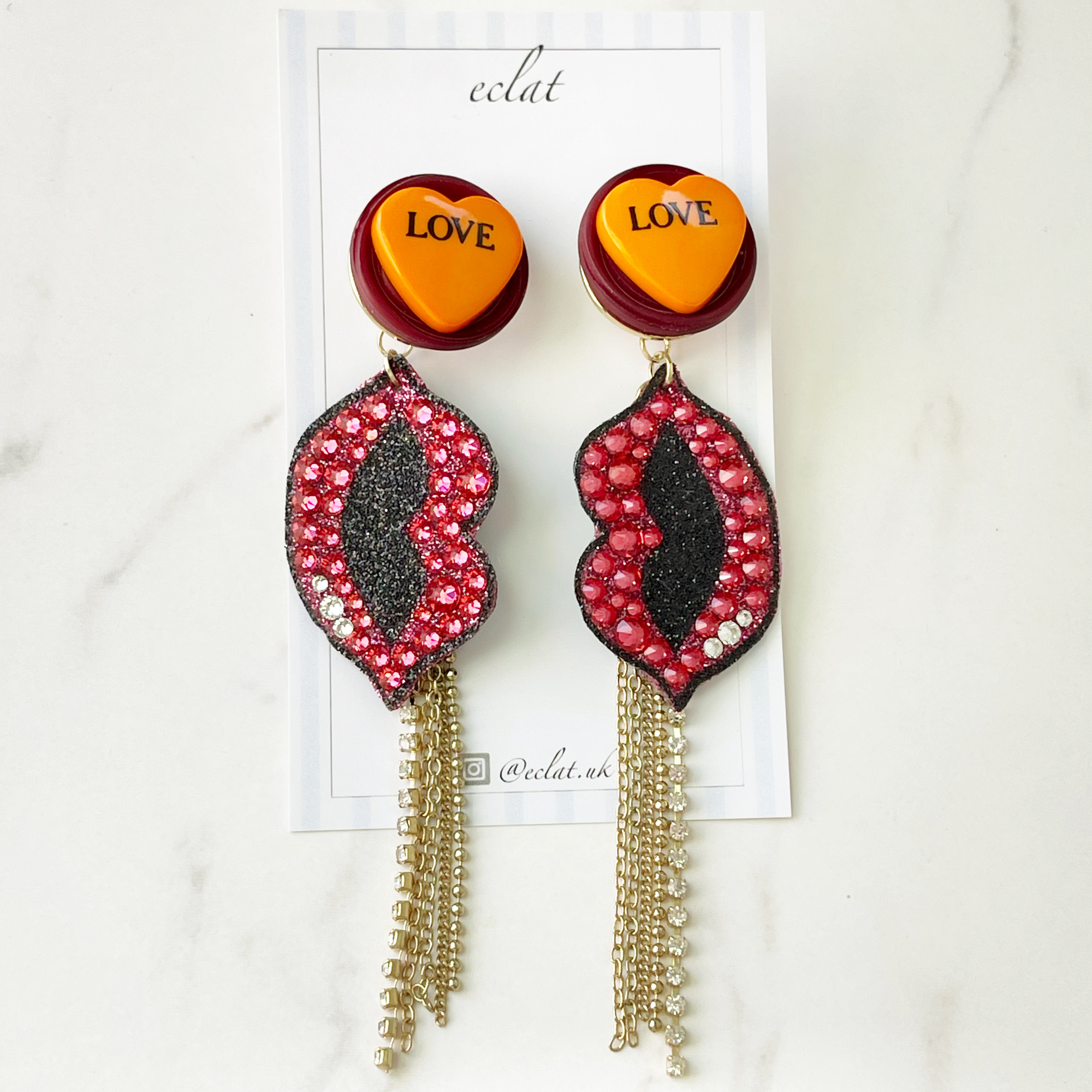 LOVE♡じゃらじゃら唇ピアス レザーのロングピアス