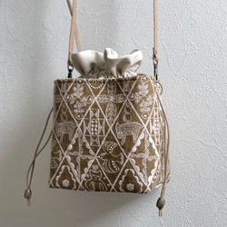 ⚮̈ミナペルホネン forest tile ライトブルー ネリオバッグ 巾着バッグ