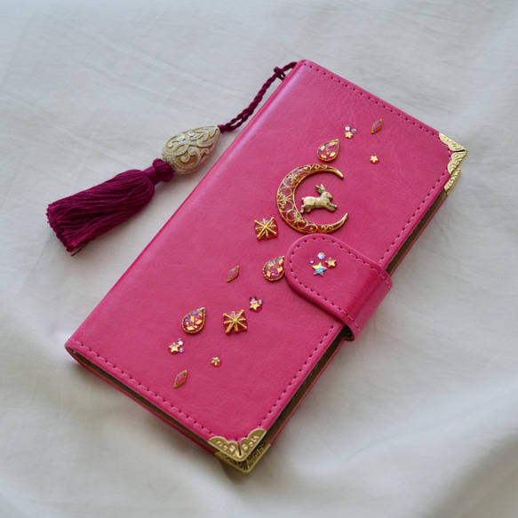 星達の輝き。手帳型スマホケース『うさぎと月のロマンティック』ぴょんと飛ぶ兎、大人可愛いピンクとゴールド☆全機種対応 2枚目の画像