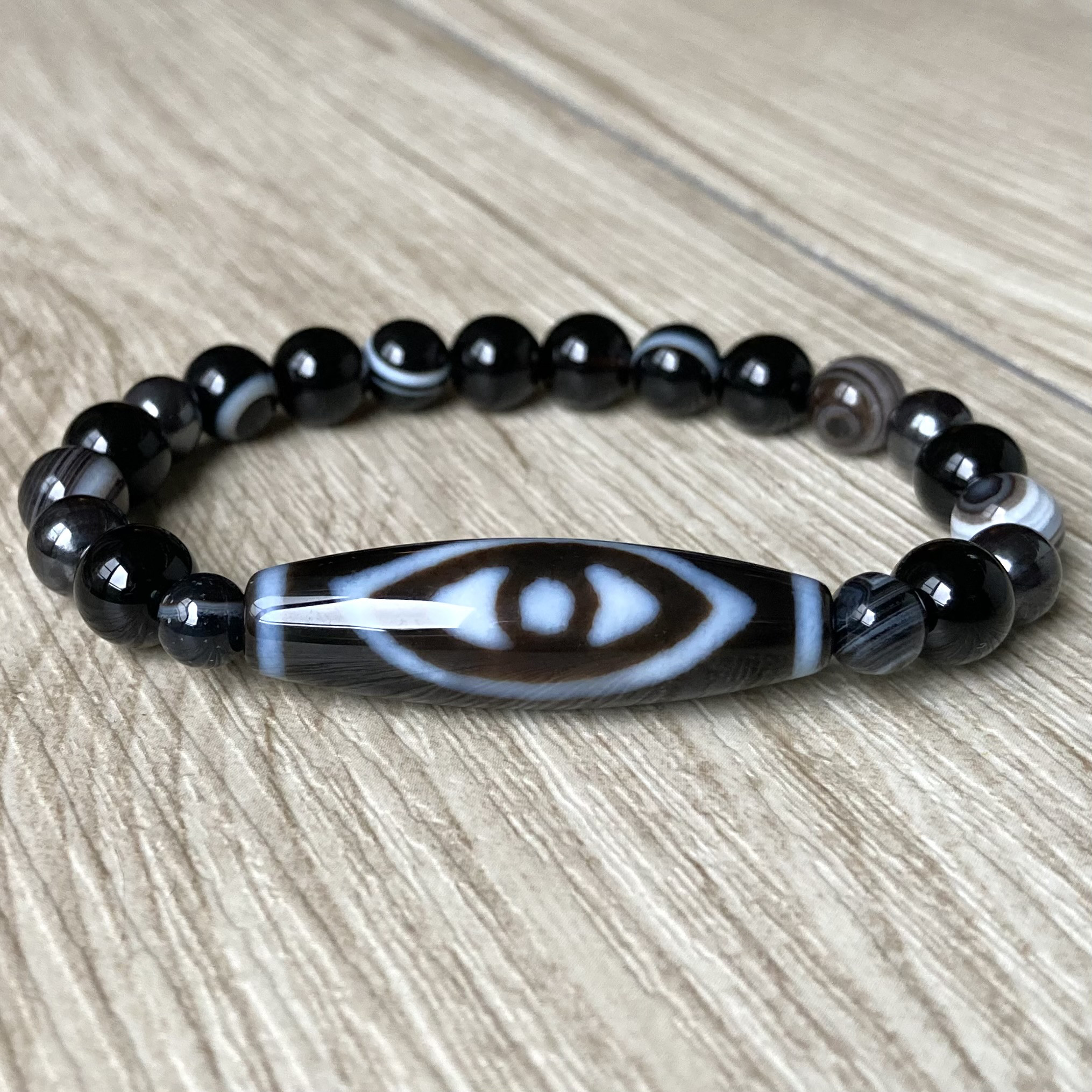 鳳凰の眼で災いを除ける/鳳凰眼天珠・モリオン・天眼石・スギライト