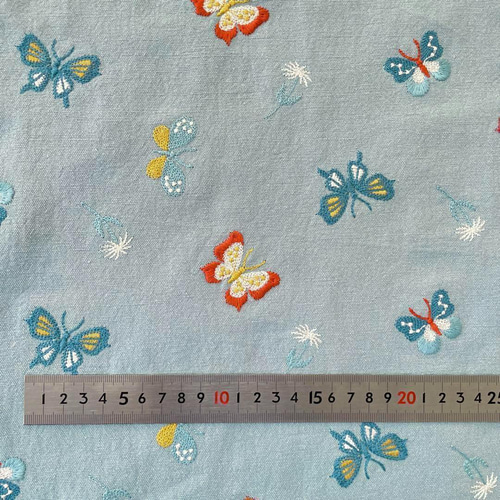s10-b▽コットンリネン刺繡生地▽蝶柄 高級感 ブルー 水色 バタフライ