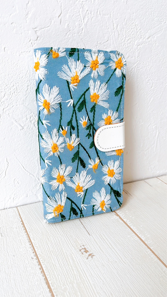 手帳型　風にそよぐマーガレット　ブルー　iPhoneケース 2枚目の画像
