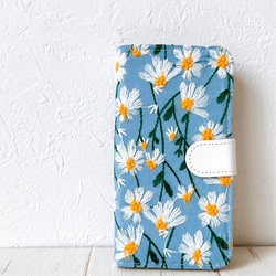 手帳型　風にそよぐマーガレット　ブルー　iPhoneケース 1枚目の画像