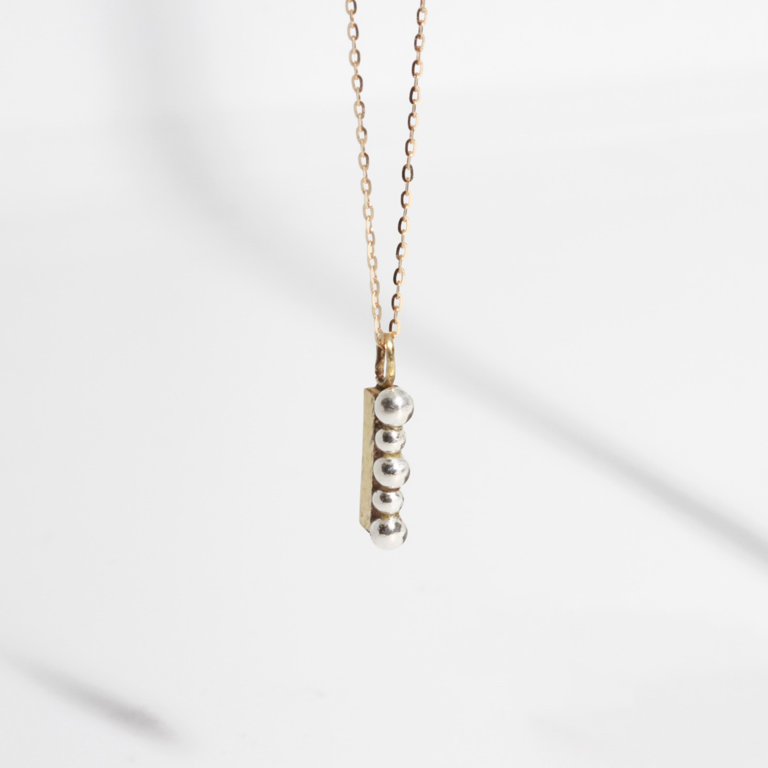 silver button necklace　真鍮／シルバー999（チェーン：K10）