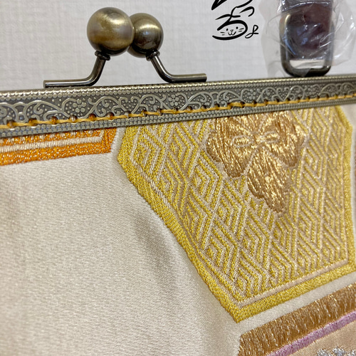 帯リメイク 亀甲に桐菊橘 持ち手付きがま口バッグ 【公式通販】