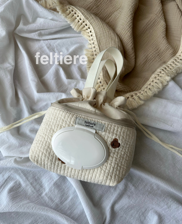 フタつきオムツポーチ巾着型 ヌビ クマ オフホワイト ポーチ feltiere 