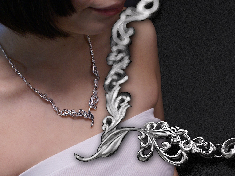 発表会や結婚式の晴れ舞台にピッタリのドレスにもよく似合うボリュームのある唐草のネックレス