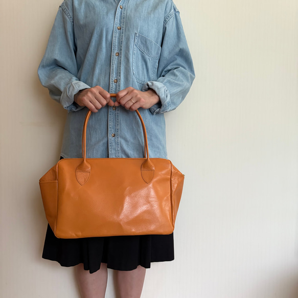 秋の差し色。本革 パラシュートバッグ／オレンジ｜ミリタリールーツ×くったりレザーの相棒 1枚目の画像