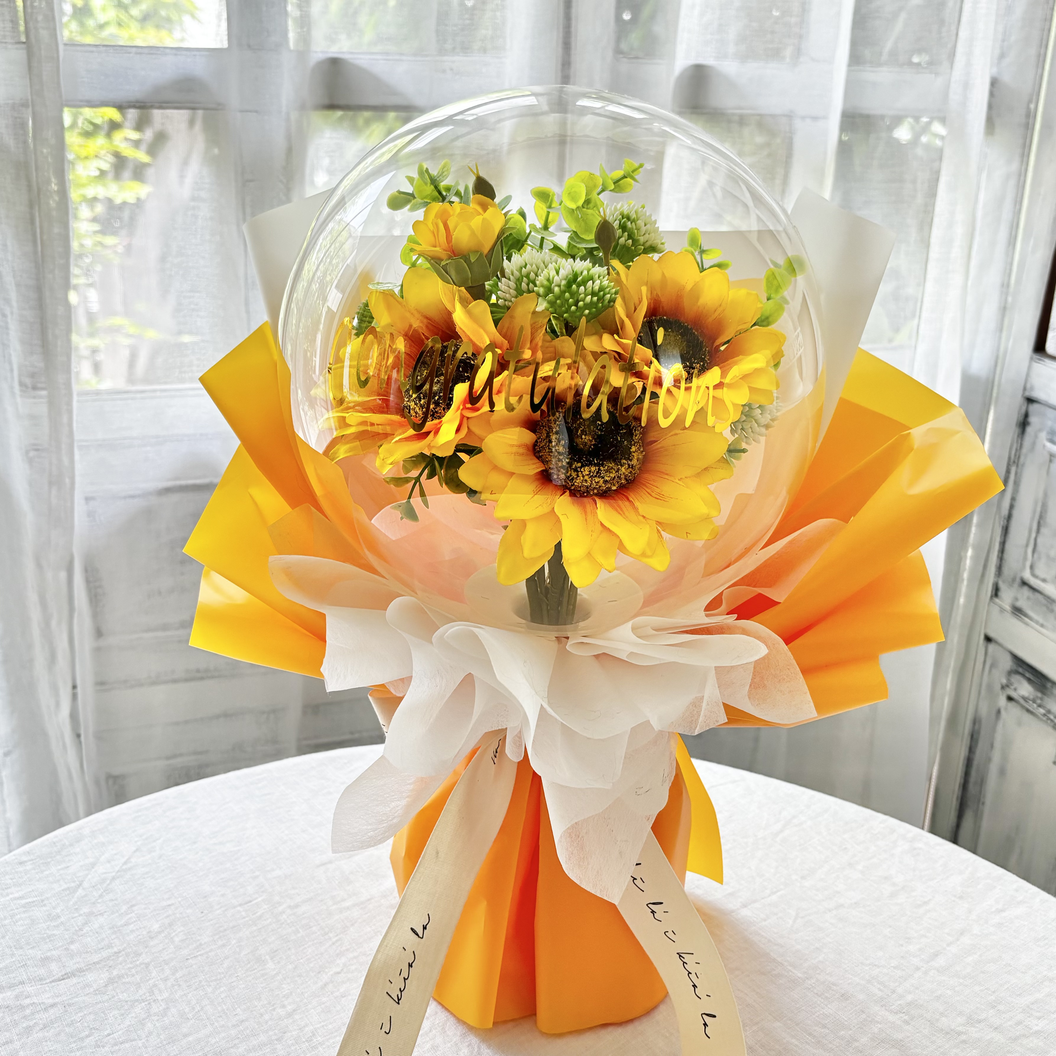 ひまわりのバルーンフラワー｜クリアバルーンブーケ｜お祝い・開店祝い・誕生日・発表会・退職祝いに｜元気が伝わる花ギフト