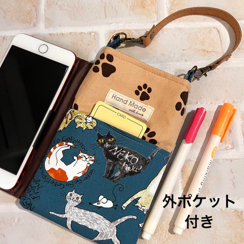 ハンドメイドスマホポーチ肉球とやんちゃ猫グリーン小物入れ