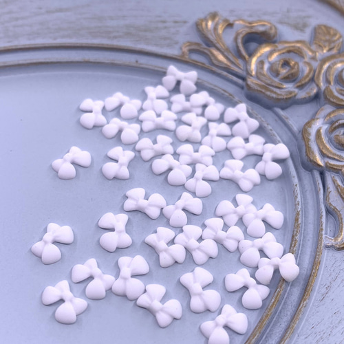 ネイルパーツ リボン デコパーツ ネイルパーツ リボン ホワイト 7mm 艶消し 50個 ミニ 3D 蝶々
