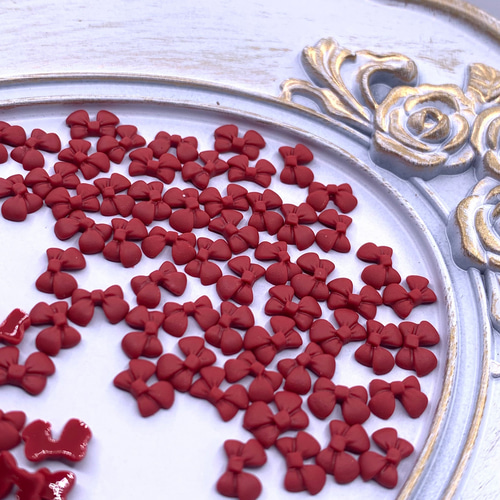 ネイルパーツ リボン 赤 7mm 艶消し 50個 ミニ 3D 立体 蝶々結び