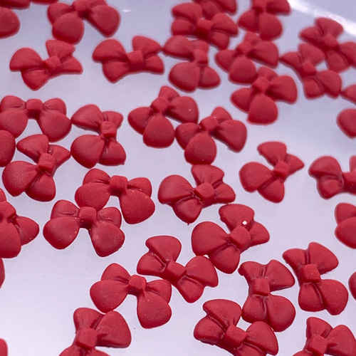 ネイルパーツ リボン 赤 7mm 艶消し 50個 ミニ 3D 立体 蝶々結び