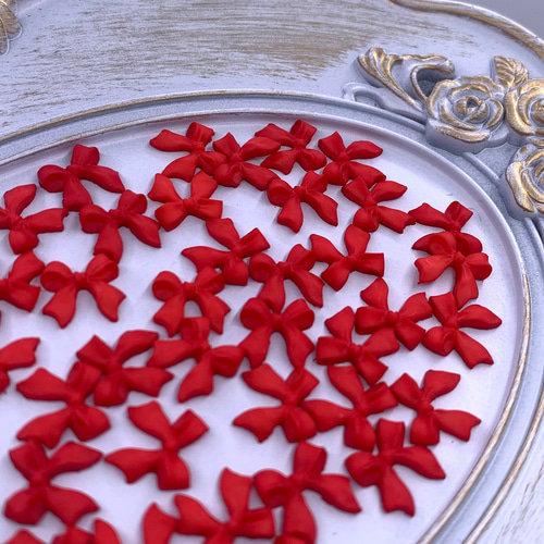 ネイルパーツ リボン デコパーツ ネイルパーツ リボン 赤 10mm 3D 立体 艶消し 50個 小さめ 蝶々結び