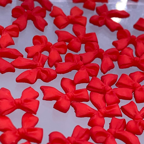 ネイルパーツ リボン 赤 10mm 3D 立体 艶消し 50個 小さめ 蝶々結び