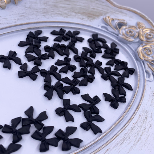 ネイルパーツ リボン 黒 10mm 3D 立体 艶消し 50個 小さめ 蝶々結び