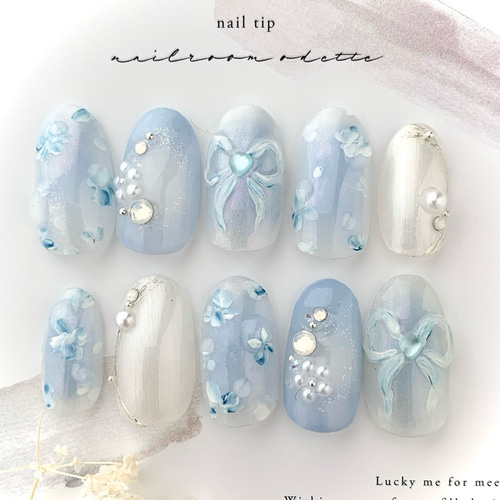 再掲】新作 ブルーのぷっくりリボンネイルチップ ちゅるん オーロラ