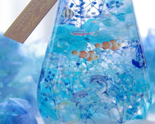 青いガラスのイルカのボトル 7d76b721b72e71698a13536db8a76e