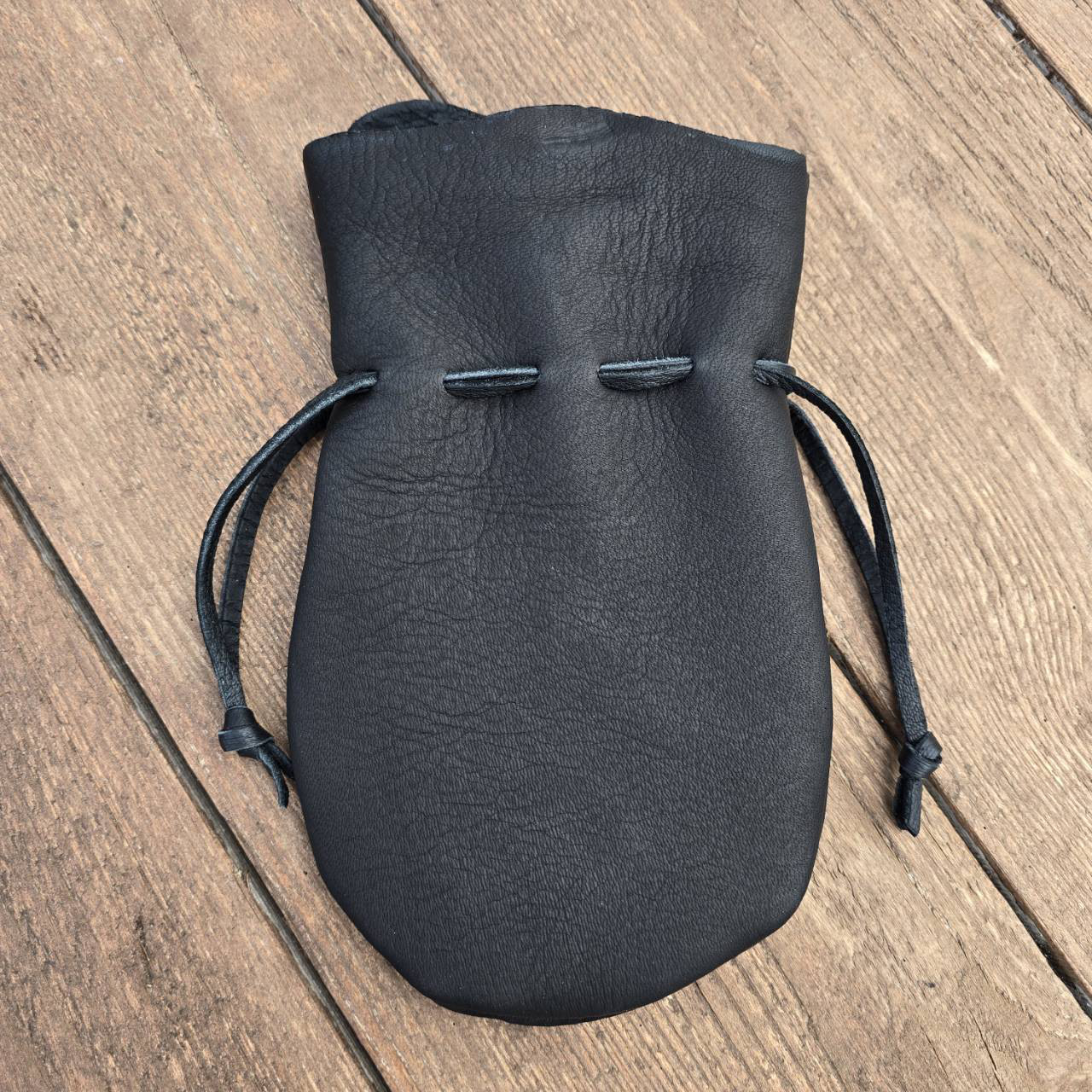 革 巾着袋 コインケース アンモナイト 革 巾着袋 コインケース アンモナイト