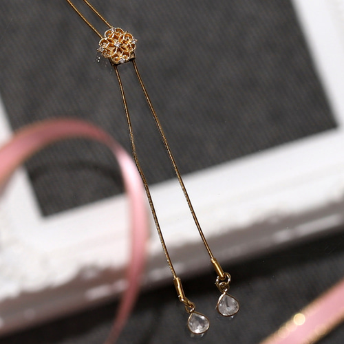 再販】フィリグリークリスタルループタイロングネックレス【サージカル