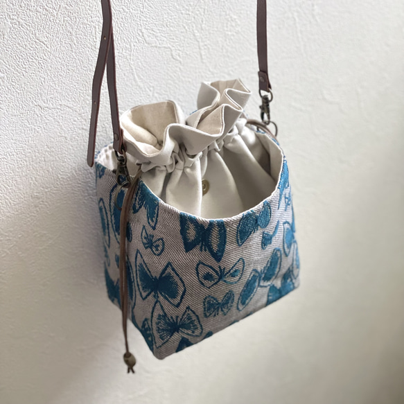 ⚮̈ミナペルホネン　sky flower ブルーグリーン ネリオバッグ　あおり巾着 flower ネリオバッグ　あおり巾着 ⚮̈ミナペルホネン　sky ブルーグリーン R1411897702(10920円)