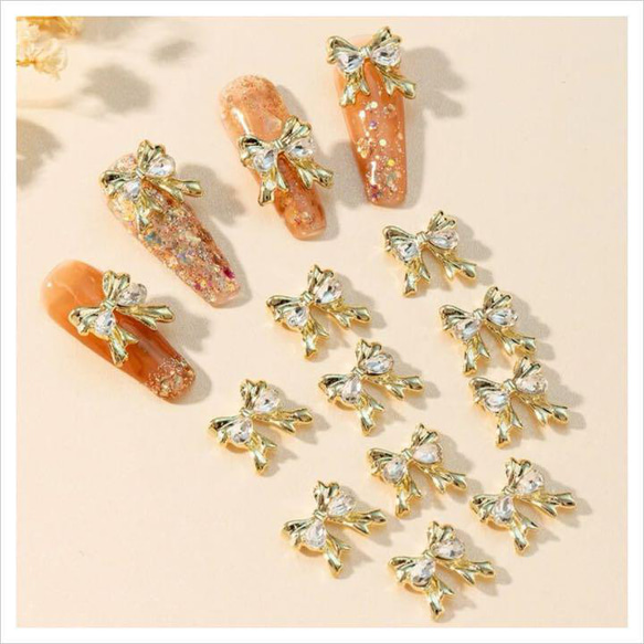 P237《2個》ネイルパーツ ゴールド 金 キラキラ 韓国ネイル リボン  