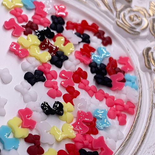 ネイルパーツ リボン 小さめ カラフル 7mm 艶消し 100個 ミニ 蝶結び