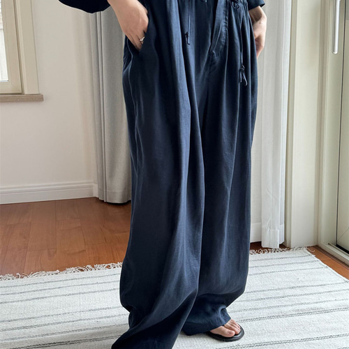 韓国スタイルの怠惰なわずかにシースルーのリネンジャンプスーツ快適な