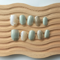 爽やかブルーマグネットネイル　夏ネイル　マーガレット　ブルー　バカラネイル 4枚目の画像