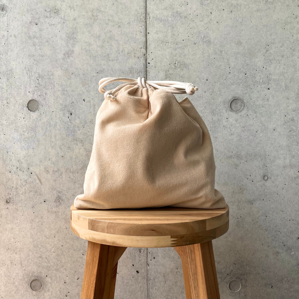 HUMAN MADE 巾着バッグ アイボリー　未使用 HUMAN MADE - 限定 HUMAN MADE - ギフト用巾着袋の通販 by Pierre's