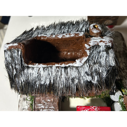 モルタルハウス 里の冬 茅葺き屋根の家