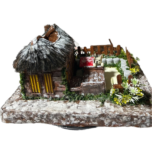 モルタルハウス 里の冬 茅葺き屋根の家