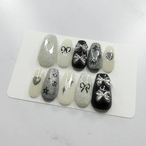 【オーダー】ネイルチップ　ワンホン　韓国　キラキラ　リボン　ホワイト　ワンカラー m52440006306_1.jpg?1723324146