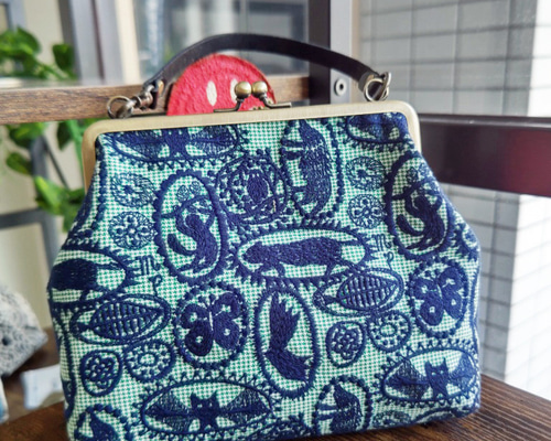 送料無料】ミナペルホネン/ジャングルレリーフグリーン本革がま口