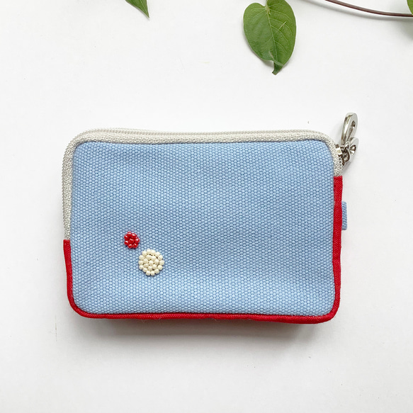 カードポーチ「きゃぁ。らっこ」手刺繍　イヤホンケース　お財布　ラッコ 7枚目の画像