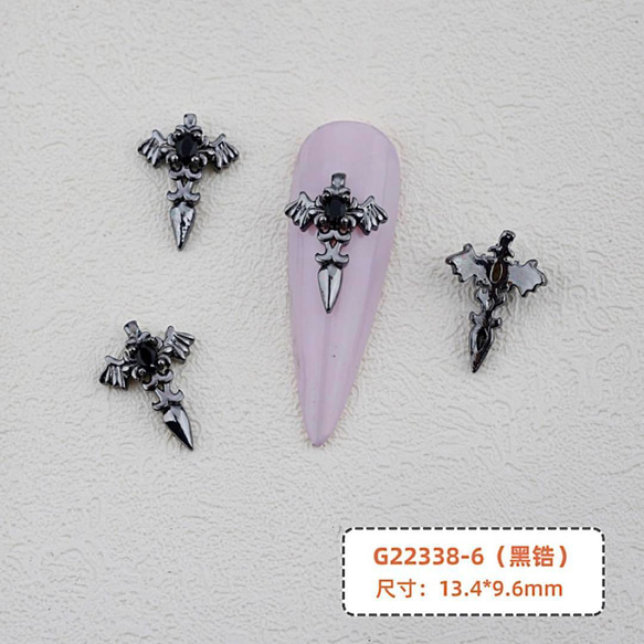 P616黒《1個》ネイルパーツ 十字架 クロス ロック 羽根