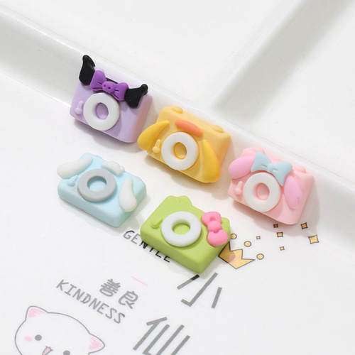 P669(2個)ネイルパーツ 水色 青 マイメロ サンリオ カメラ 痛ネイル