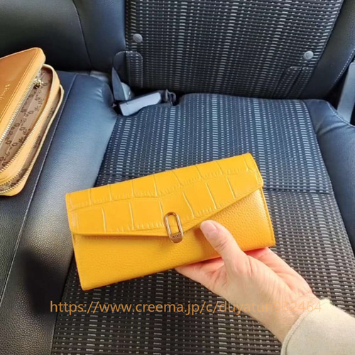 値下げ⭐︎レザー二つ折り長財布 グレージュ　イエロー IL BISONTE イルビゾンテ 財布 二つ折り 長財布 ボタン L字