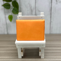 ２つ折りパスケース　本革　オレンジ 1枚目の画像