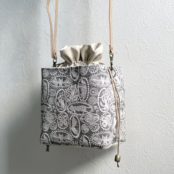 ⚮̈ミナペルホネンjungle relief ネリオバッグあおり巾着