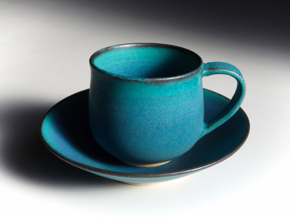 綠松石杯子和碟子 第1張的照片