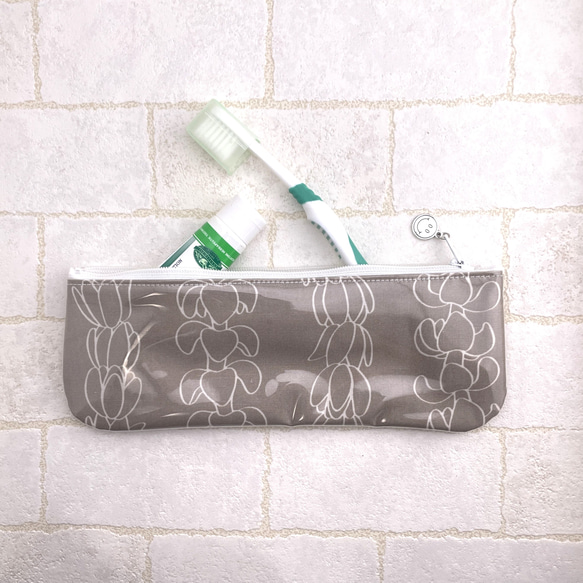 歯ブラシケース（コスメポーチ）　ハワイアン生地にビニール地を合わせたポーチ 1枚目の画像